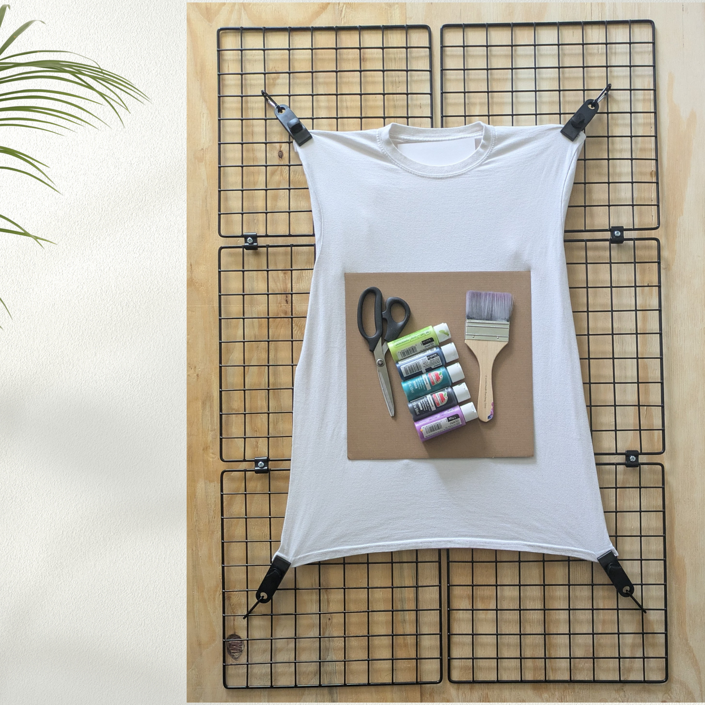 White shirt ready to be designed and painted with the Shirt Stretcher Crafting Frame