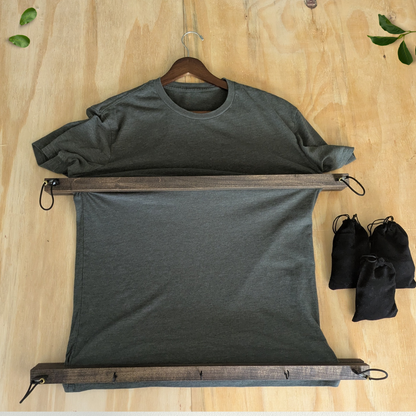 Shirt Stretcher being assembled on a wooden table