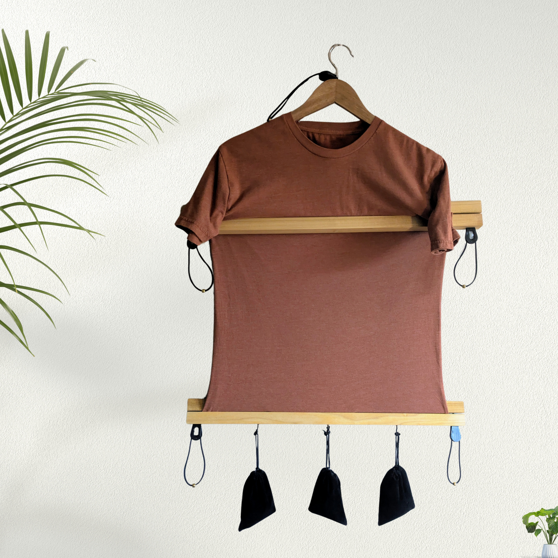 Shirt stretcher restoring fabric shape and size through stretching